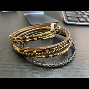 Silver and gold bangle bracelets